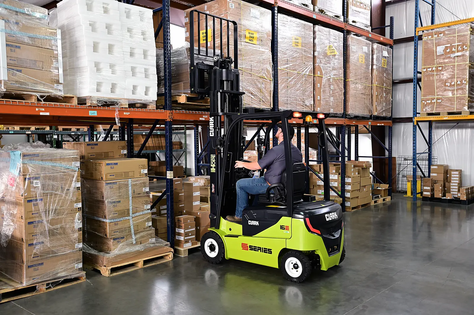 Forklift working in front of pallet racking at a warehouse in Dundalk, MD